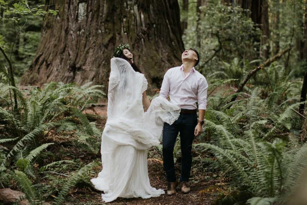 Bride and Groom smiling in Redwoods forest